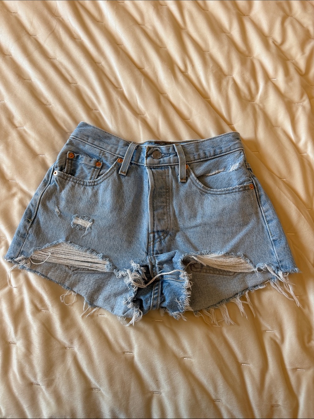Levi's 501 Light Blue Distressed Denim Shorts